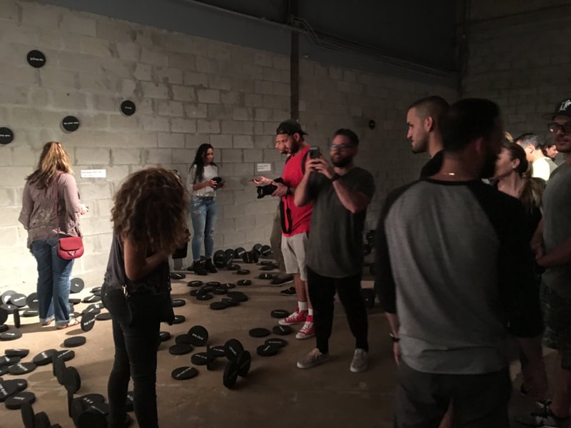 PRE_TEXTING — Nerve Festival visitors exploring disc installation