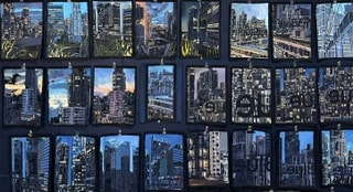 On Studio Wall Series, 60 cityscape paintings displayed together on the studio wall